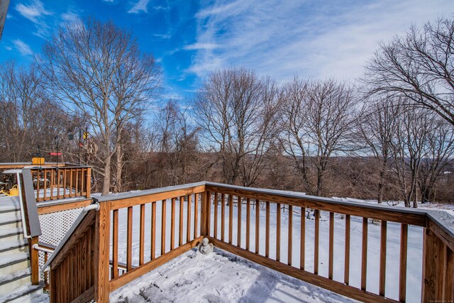 view of snow covered deck