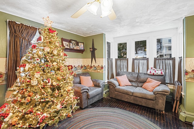 living room featuring a textured ceiling, a baseboard heating unit, a ceiling fan, baseboard heating, and dark wood-style floors