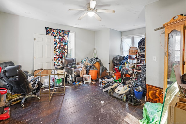 interior space featuring dark wood finished floors and a ceiling fan