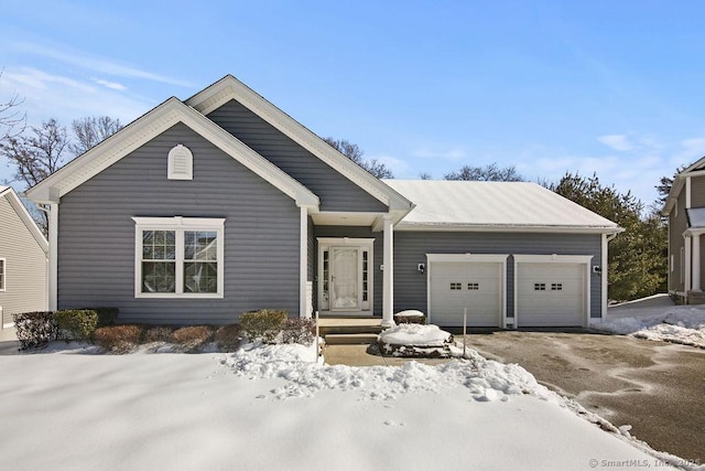 view of front of house with a garage and driveway