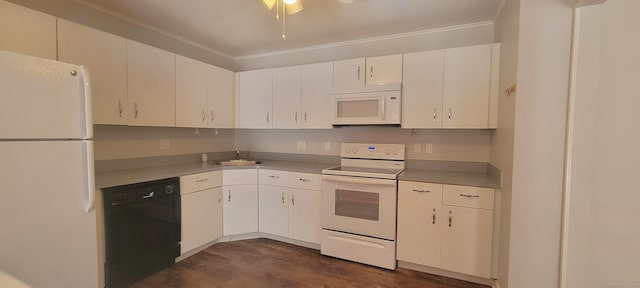 kitchen with ornamental molding, white appliances, white cabinets, and dark wood finished floors