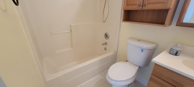 bathroom featuring bathtub / shower combination, vanity, and toilet