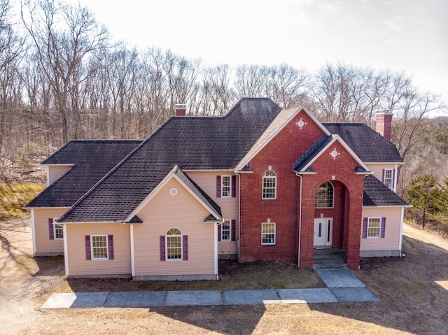 traditional-style home with a chimney