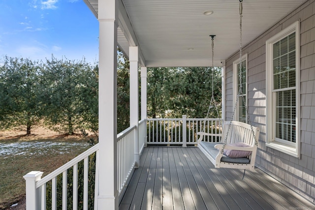 deck featuring a water view