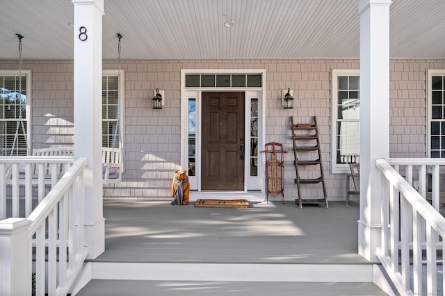 entrance to property with covered porch