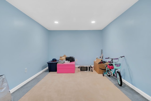 game room with recessed lighting, carpet flooring, and baseboards