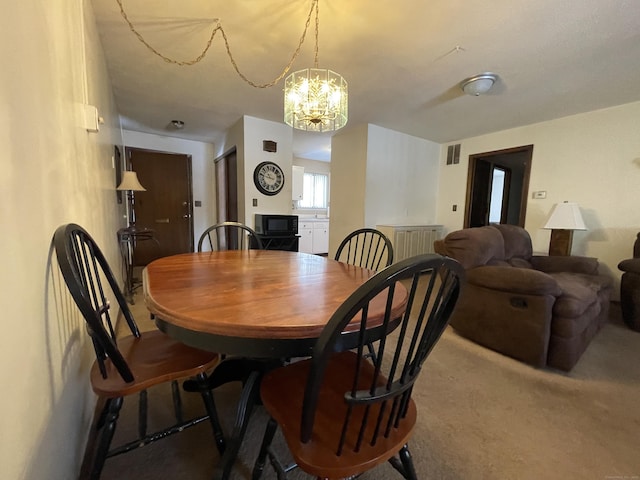 dining space featuring visible vents