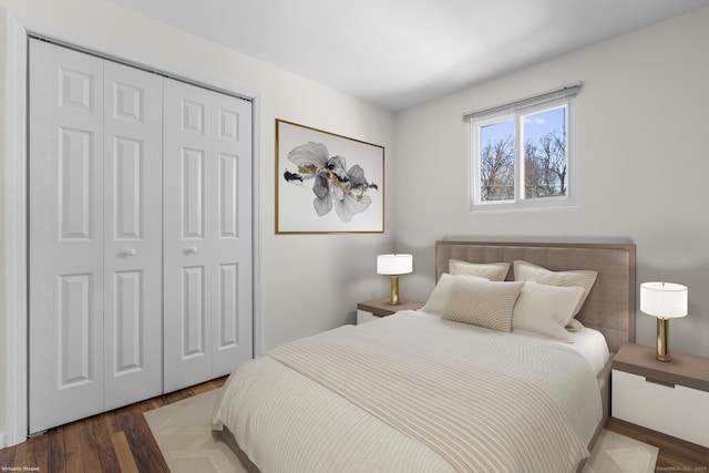 bedroom featuring a closet and wood finished floors