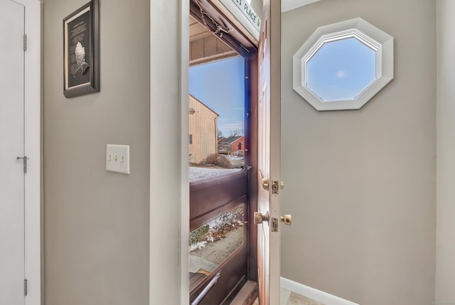 interior space with baseboards