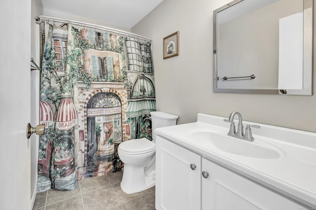 full bathroom featuring toilet, tile patterned flooring, and vanity