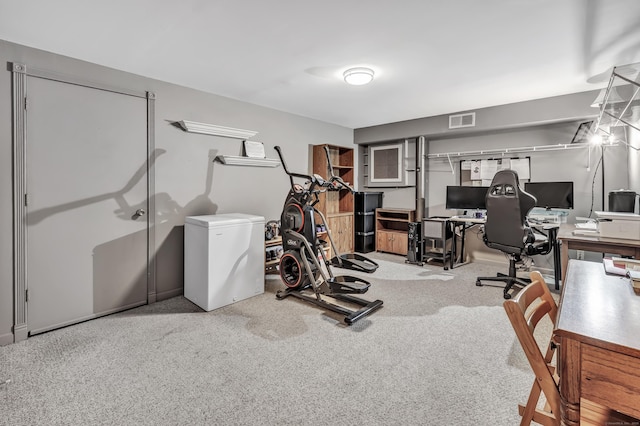 workout area with carpet and visible vents