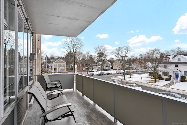 balcony featuring a residential view