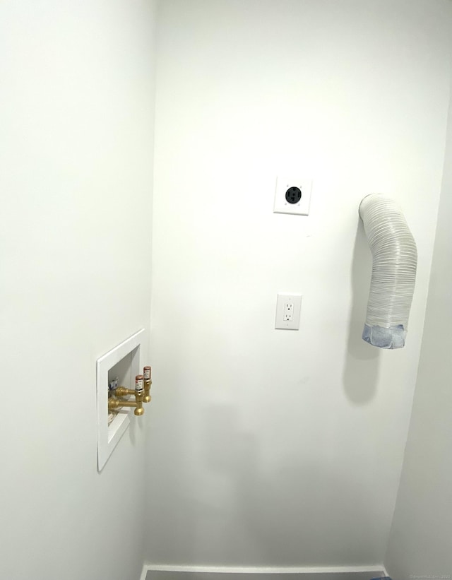 clothes washing area featuring electric dryer hookup, laundry area, and hookup for a washing machine