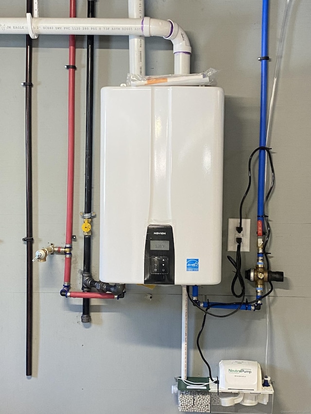 utility room with water heater