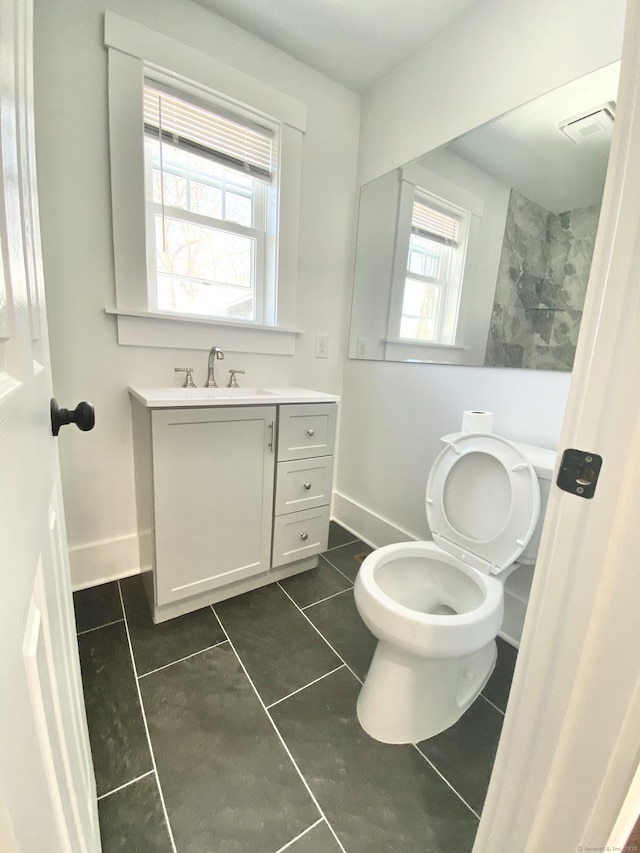 full bath featuring visible vents, tile patterned floors, baseboards, vanity, and toilet