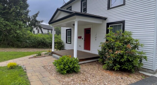 11 Charles St, Torrington, CT 06790 - view of exterior entry with a porch