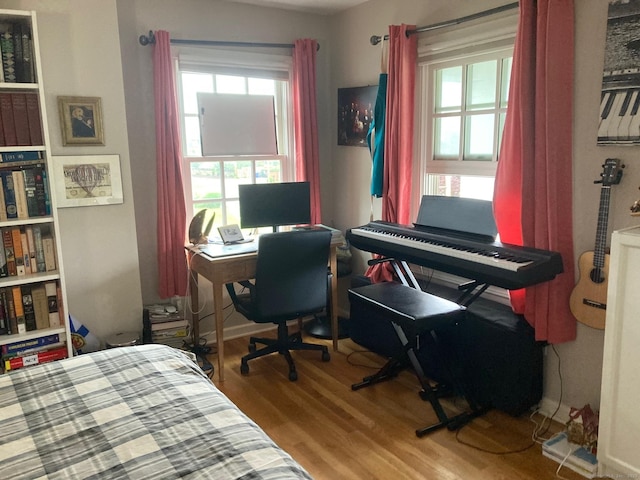 bedroom with wood finished floors