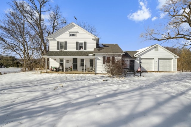 view of front of house featuring a garage and covered porch