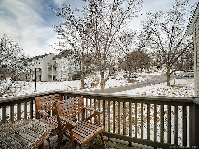 view of snow covered deck