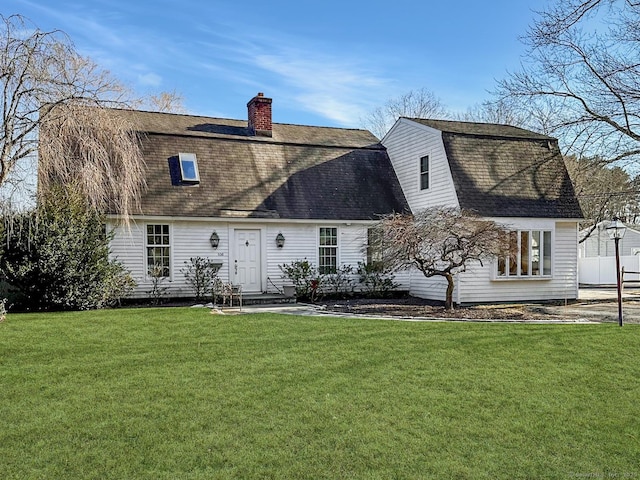 106 Shadow Ridge Rd, Stamford, CT 06905 - rear view of house featuring a shingled roof, a lawn, a chimney, and a gambrel roof