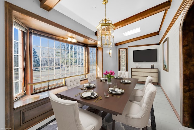 dining room featuring vaulted ceiling with beams, light tile patterned floors, baseboards, and a notable chandelier