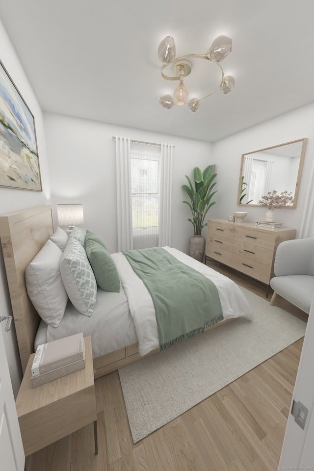 bedroom with wood finished floors
