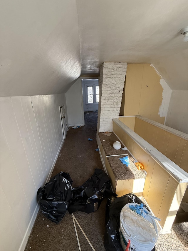 bonus room featuring vaulted ceiling