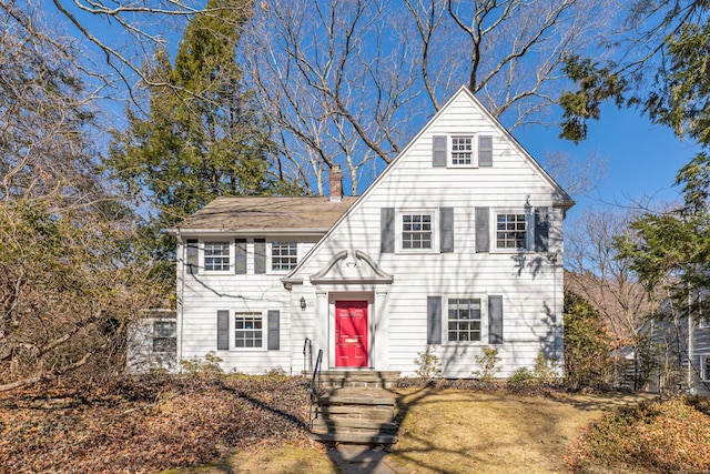 view of front of property featuring a chimney