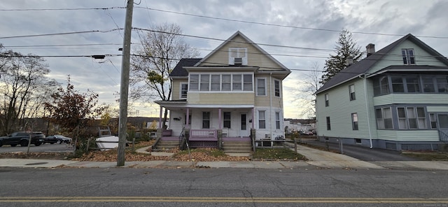 view of front of property featuring covered porch