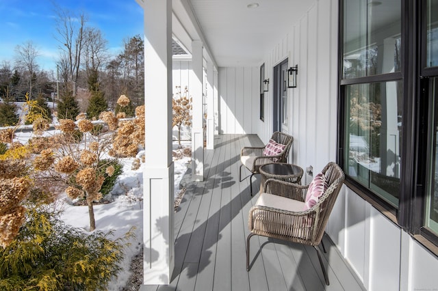 view of snow covered deck