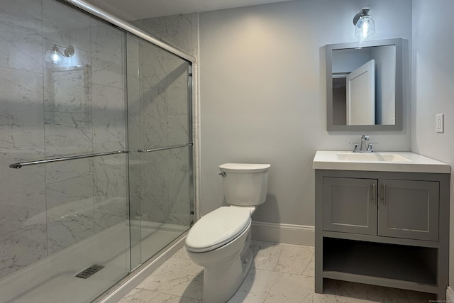 full bath with toilet, vanity, baseboards, marble finish floor, and a shower stall