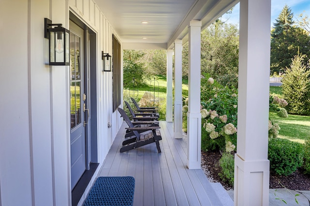 wooden terrace with a porch