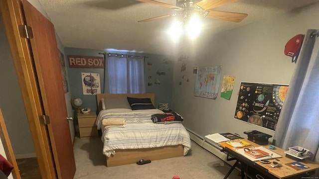 bedroom featuring ceiling fan and carpet