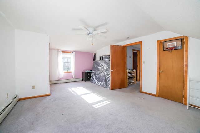 bonus room with carpet, baseboard heating, vaulted ceiling, and ceiling fan