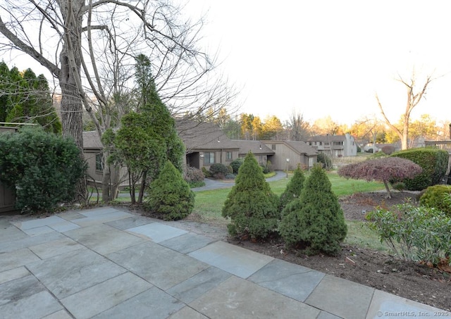 view of front of property with a patio area and a residential view