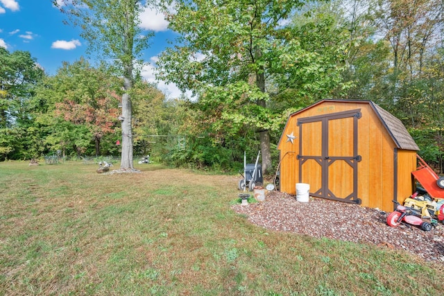 view of yard with a storage shed and an outdoor structure