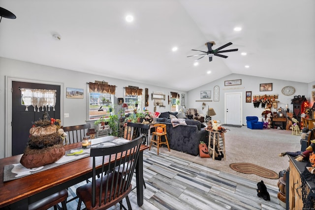 dining area with lofted ceiling, ceiling fan, light carpet, and recessed lighting