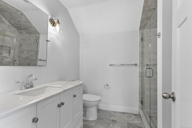 bathroom with lofted ceiling, marble finish flooring, a shower stall, toilet, and vanity