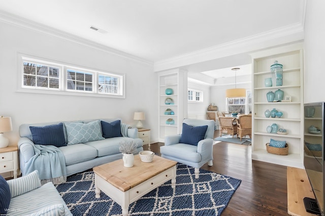 430 Edward St, Fairfield, CT 06824 - living room with plenty of natural light, crown molding, and dark wood-style flooring
