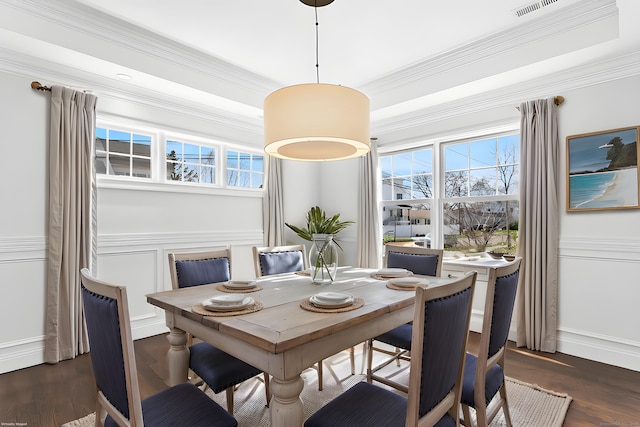 430 Edward St, Fairfield, CT 06824 - dining room featuring ornamental molding, dark wood-style flooring, a wainscoted wall, and a decorative wall