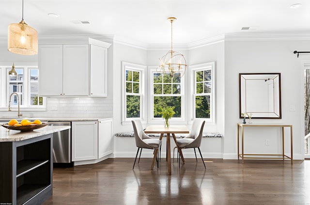 430 Edward St, Fairfield, CT 06824 - dining space with a chandelier, baseboards, dark wood finished floors, and crown molding