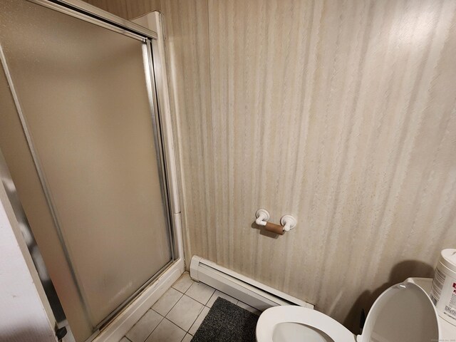 189 Kaynor Dr Apt C, Waterbury, CT 06708 - bathroom with a baseboard radiator, a shower with door, tile patterned flooring, and toilet