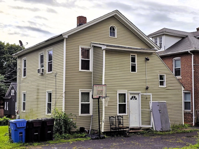 view of front of home with a chimney