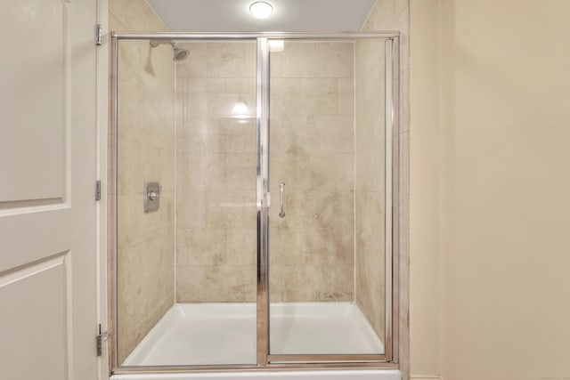 bathroom featuring a shower stall