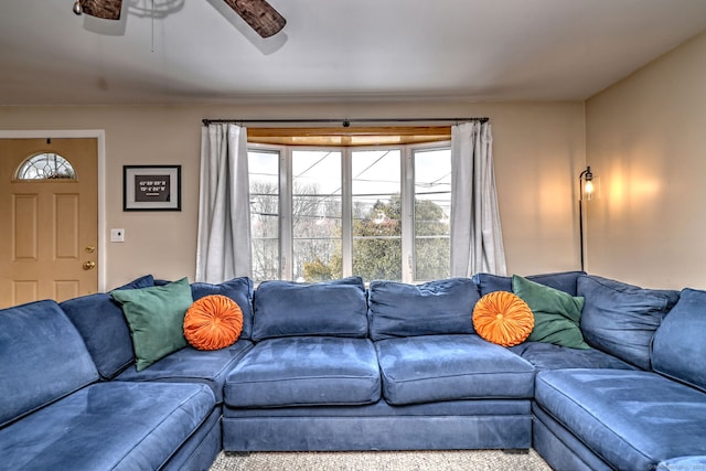 living room with ceiling fan