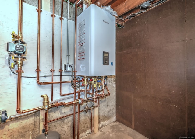 utility room with tankless water heater