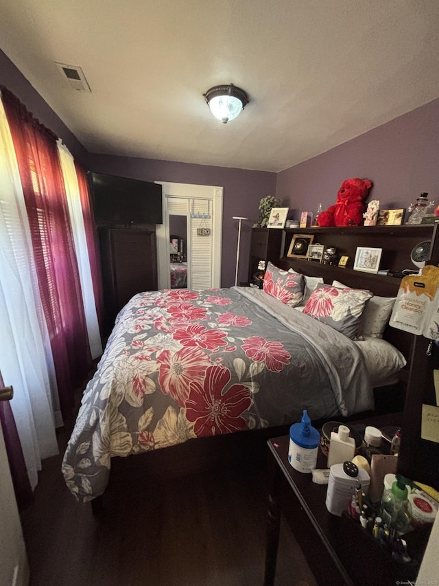 bedroom with visible vents