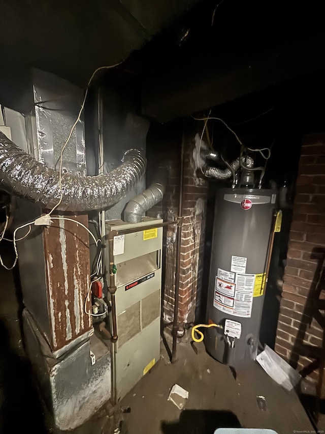 utility room with water heater