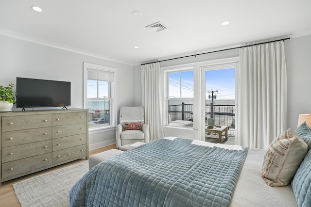 bedroom featuring ornamental molding, recessed lighting, visible vents, and light wood-style floors