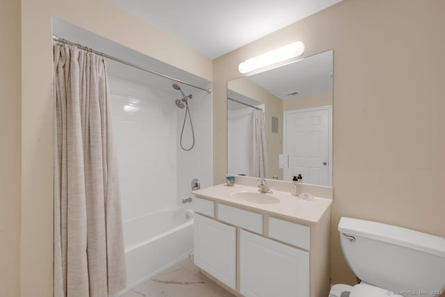 full bathroom with toilet, marble finish floor, vanity, and shower / tub combo with curtain